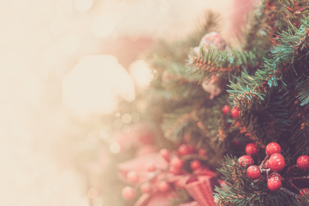 Christmas background - branches, toys, highlights. Place for congratulations.の写真素材