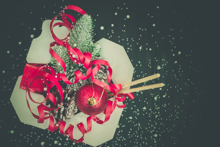 Christmas gifts in WOK paper packaging boxes. For Asian fast foods.の写真素材