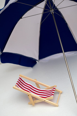 Beach chair and beach umbrella.の写真素材