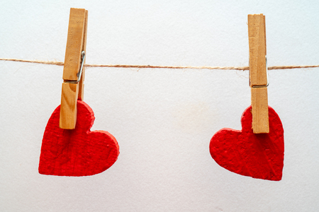 Two hearts on a clothesline.の写真素材