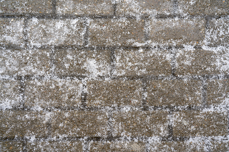 Ice crust on the road surface.の写真素材