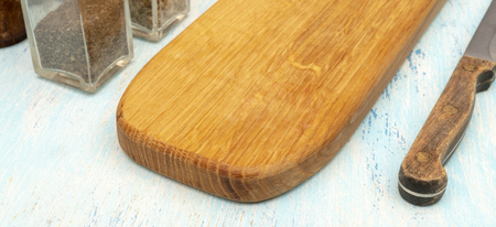 Wooden oak cutting board. Kitchenware. Copy space.の写真素材