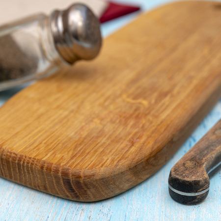 Wooden oak cutting board. Kitchenware. Copy space.の写真素材