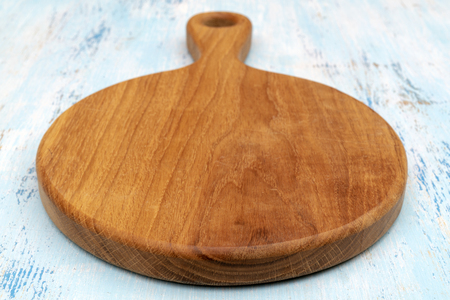 Wooden oak cutting board. Kitchenware. Copy space.の写真素材