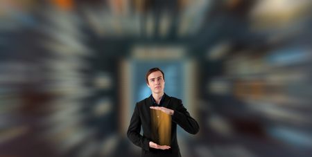 Young scientist on a futuristic background.の写真素材