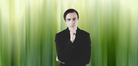 Young scientist on a futuristic background.の写真素材