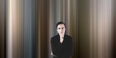 Young scientist on a futuristic background.の写真素材