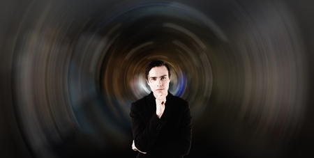 Young scientist on a futuristic background.の写真素材