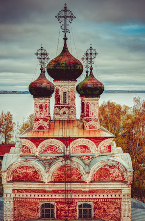 Old destroyed red orthodox church.の写真素材