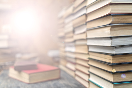 Rows of books in the library. Background for text. Symbol of knowledge and learning.の写真素材