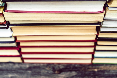 Rows of books in the library. Background for text. Symbol of knowledge and learning.の写真素材