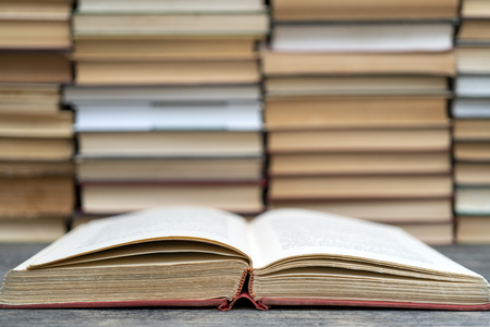 Old book in the red obnozhka. Symbol of knowledge and learning.の写真素材