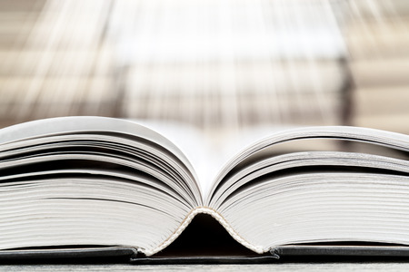 Book pages emit light. Symbol of wisdom, knowledge and learning.の写真素材