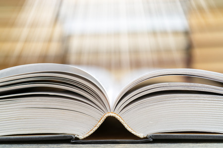 Book pages emit light. Symbol of wisdom, knowledge and learning.の写真素材