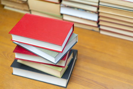 Stack of books in the library. Symbol of knowledge and learning.の写真素材