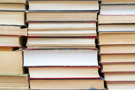 Rows of books in the library. Background for text. Symbol of knowledge and learning.の写真素材