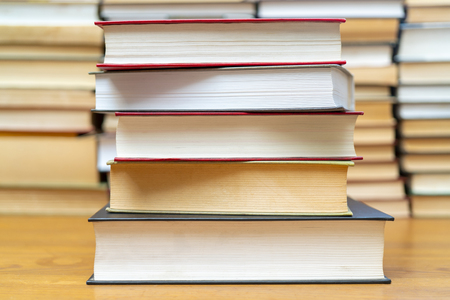 Stack of books in the library. Symbol of knowledge and learning.の写真素材