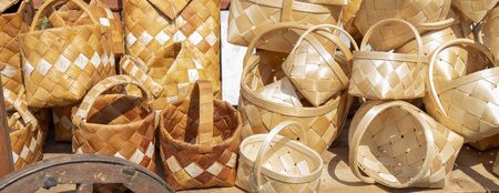Baskets are made by hand from bast.の写真素材