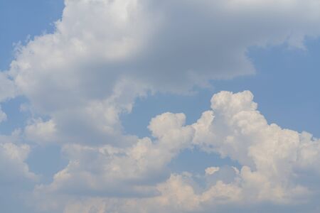 White clouds in the blue sky. Atmospheric phenomenon.の写真素材