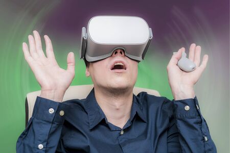 Young man of virtual reality. Innovation and technological advances. Modern technology for business.の写真素材