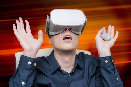 Young man of virtual reality. Innovation and technological advances. Modern technology for business.の写真素材