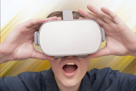 Young man of virtual reality. Innovation and technological advances. Modern technology for business.の写真素材