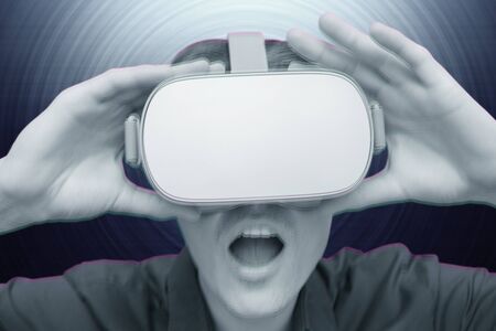 Young man of virtual reality. Innovation and technological advances. Modern technology for business.の写真素材