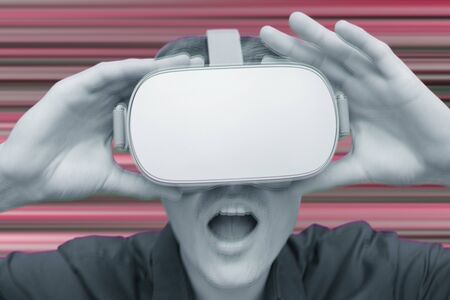 Young man of virtual reality. Innovation and technological advances. Modern technology for business.の写真素材