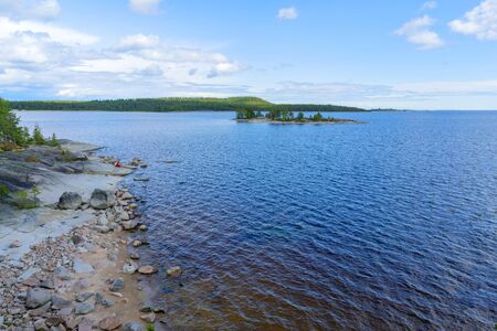 Islands in Lake Ladoga. Beautiful landscape - water, pines and boulders.の写真素材