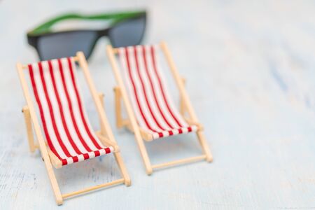 Travel set - sunglasses, deck chairの写真素材