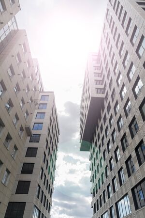 High-rise buildings of modern city. View from below.の写真素材