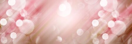 Pink background for greeting card and invitation to wedding, engagement and birthday. Glare, glow, bokeh and lighting effects.の写真素材