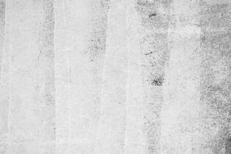 White and beige paint on the wall of a house. Construction and repair.の写真素材
