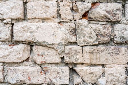 White and beige paint on the wall of a house. Construction and repair.の写真素材
