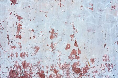 Blue and red paint on the wall of a house. Construction and repair.の写真素材