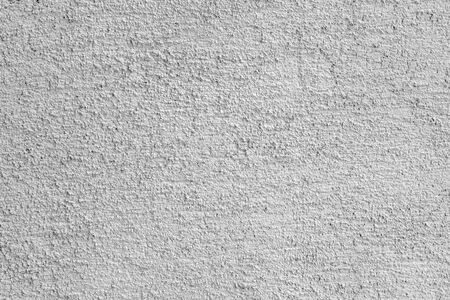 Gray stucco on wall of house. Construction industry.の写真素材