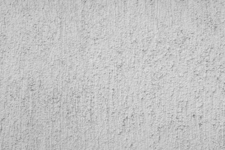 Gray stucco on wall of house. Construction industry.の写真素材