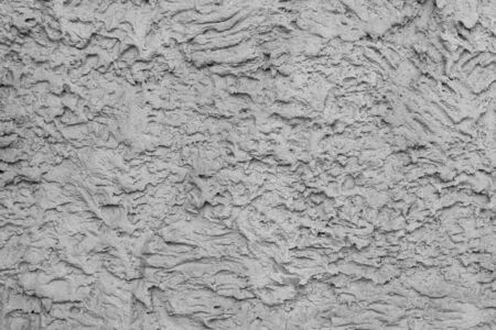 Gray stucco on wall of house. Construction industry.の写真素材