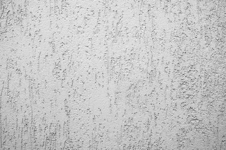 Gray stucco on wall of house. Construction industry.の写真素材