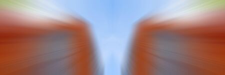 Blue and orange dynamic lines of light. Background for modern graphic design and text. の写真素材