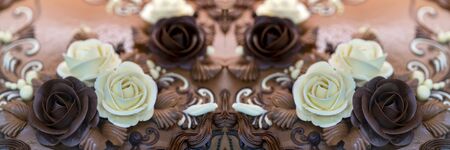 Chocolate cake. Cream flowers. Birthday Treats.の写真素材