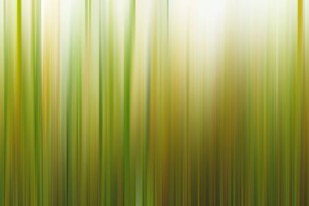 Abstract vertical lines background. Streaks are blurry in motion.の写真素材
