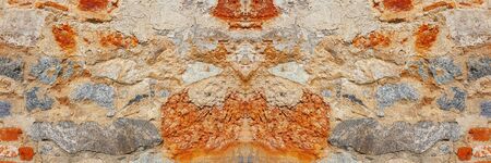 Texture of old wall. Red brick, cement and plaster.の写真素材