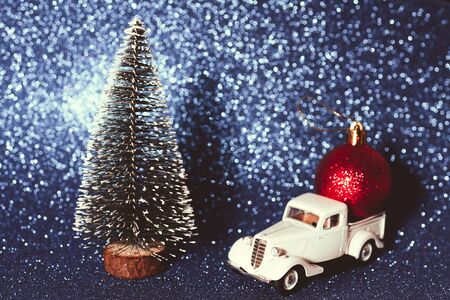Green christmas tree on shiny background. Beautiful bokeh.の写真素材