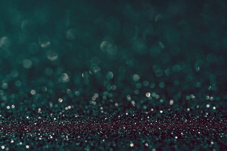Black shiny festive christmas background. Beautiful bokeh.の写真素材
