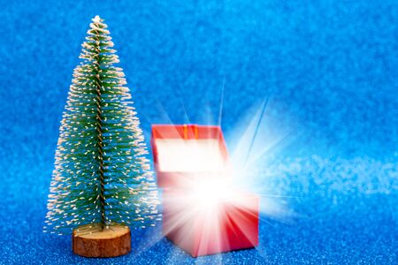 Christmas tree and gift box. Festive christmas background.の写真素材