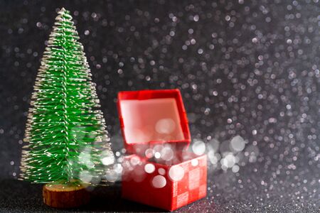 Christmas tree and gift box. Festive christmas background.の写真素材