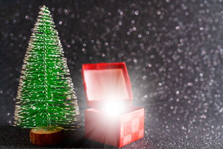 Christmas tree and gift box. Festive christmas background.の写真素材