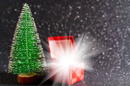 Christmas tree and gift box. Festive christmas background.の写真素材