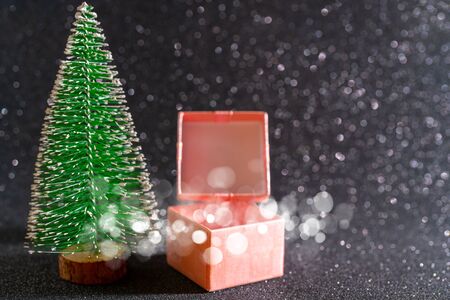Christmas tree and gift box. Festive christmas background.の写真素材